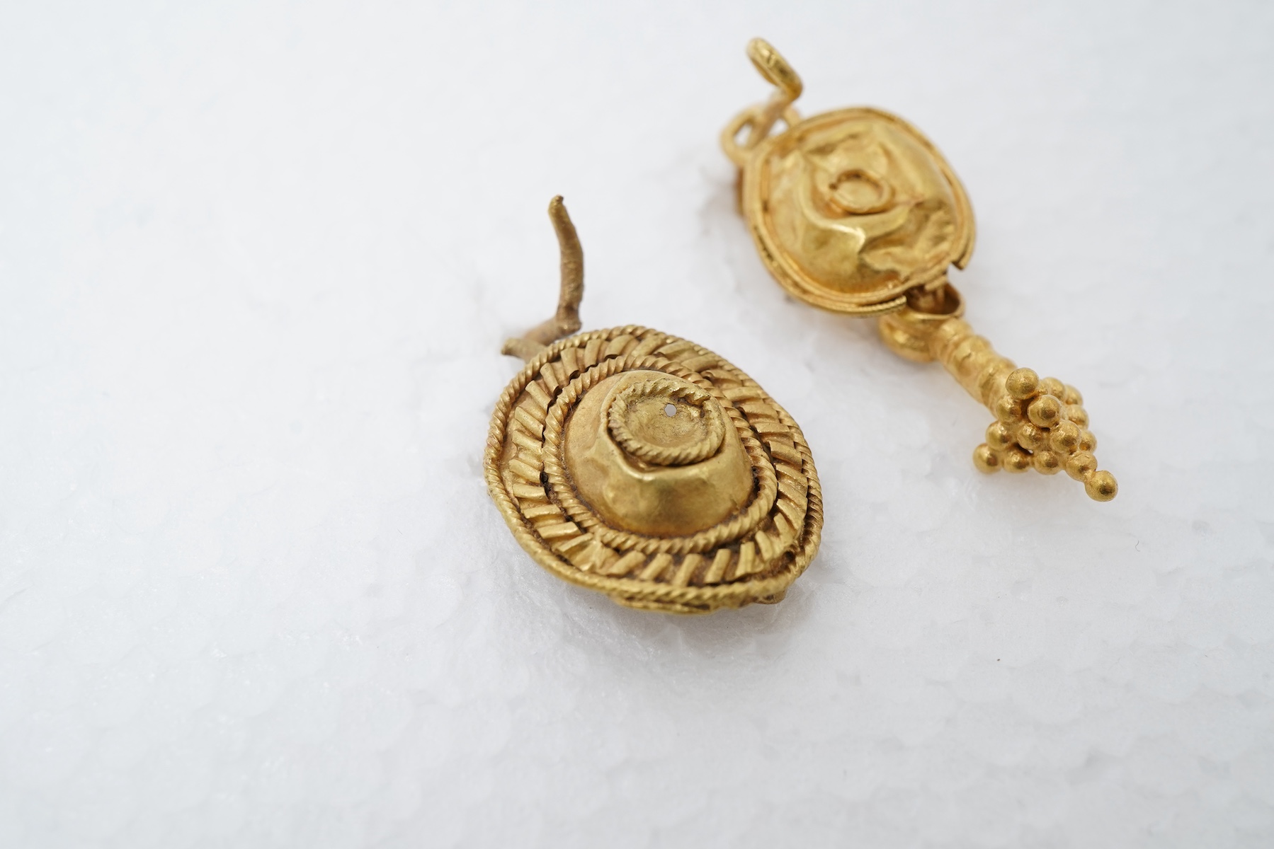 Two Roman gold earrings, circa 3rd-4th century AD